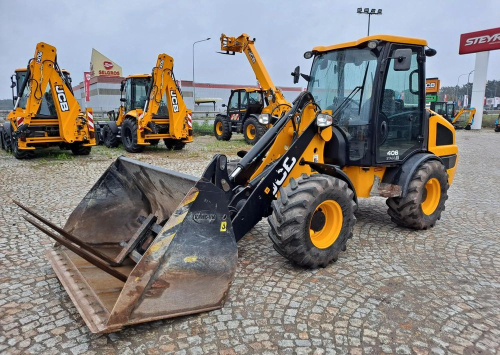 JCB 406 - Încărcător frontal pe pneuri: Foto 2 JCB 406 - Încărcător frontal pe pneuri: Foto 2