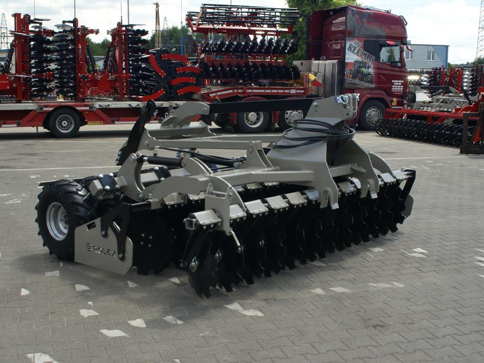 ROLEX Scheibenegge / Disc harrow with hydropack and tire roller / Dechaumeur à disques / Erpice a dischi / Дисковая борона с гидропаком и колёсным катком / Agregat talerzowy uprawowy z hydropackiem i - Grapă cu discuri: Foto 5 ROLEX Scheibenegge / Disc harrow with hydropack and tire roller / Dechaumeur à disques / Erpice a dischi / Дисковая борона с гидропаком и колёсным катком / Agregat talerzowy uprawowy z hydropackiem i - Grapă cu discuri: Foto 5