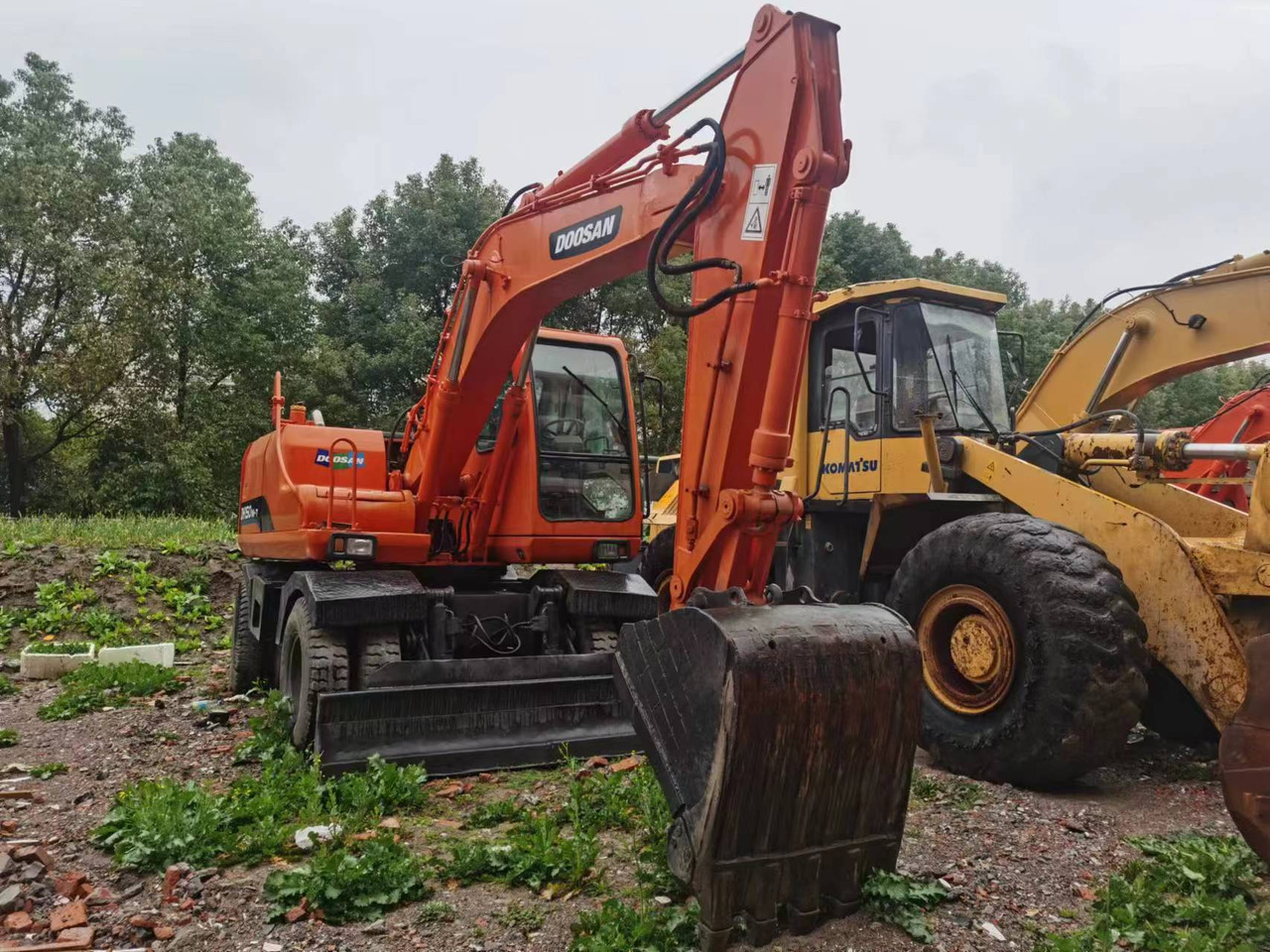 DOOSAN DH150W-7 - Excavator pe roţi: Foto 1 DOOSAN DH150W-7 - Excavator pe roţi: Foto 1