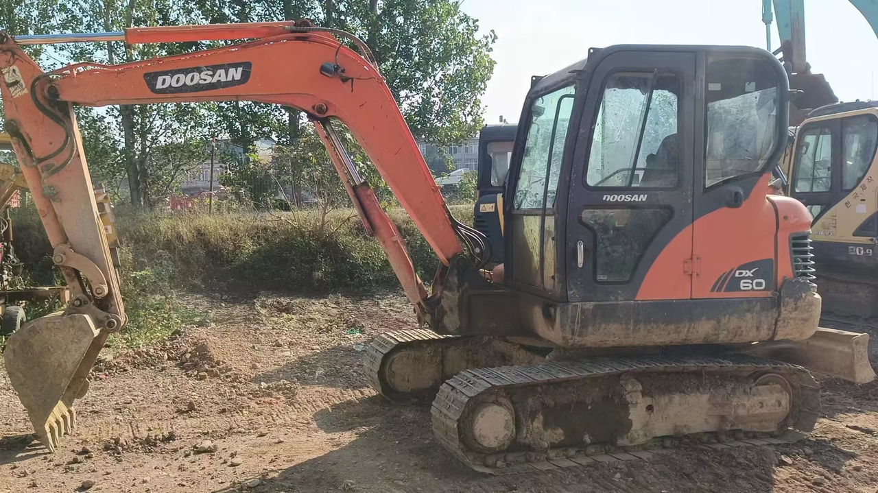 DOOSAN dx60 - Mini excavator: Foto 1 DOOSAN dx60 - Mini excavator: Foto 1