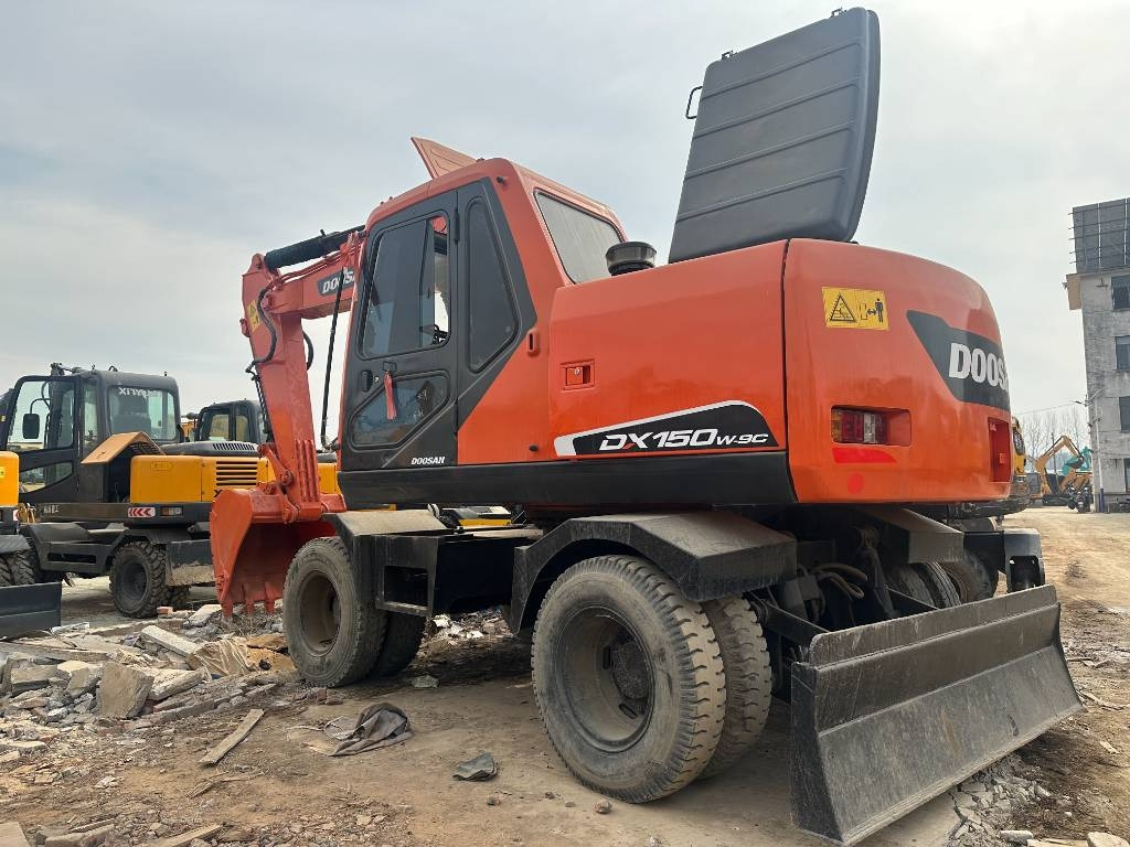 Doosan DX 150W -9 - Excavator pe roţi: Foto 1 Doosan DX 150W -9 - Excavator pe roţi: Foto 1