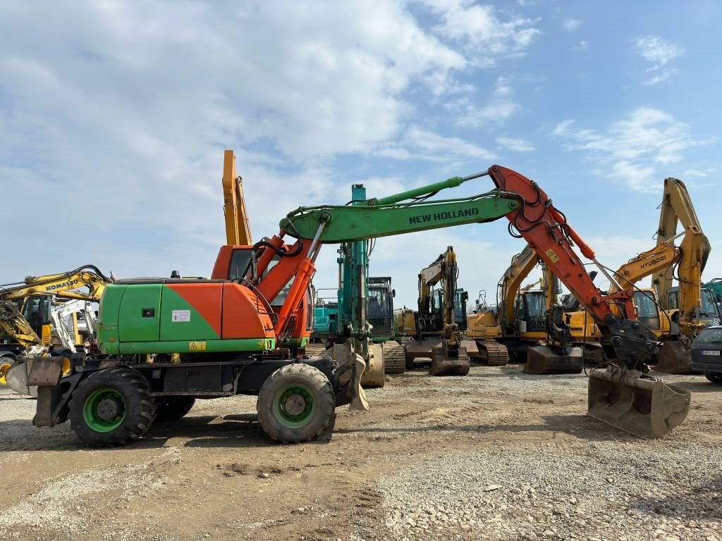 New Holland MH Plus - Excavator pe roţi: Foto 2 New Holland MH Plus - Excavator pe roţi: Foto 2