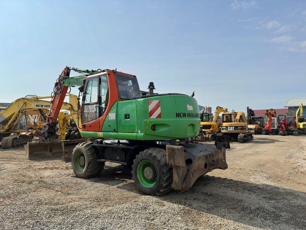 New Holland MH Plus - Excavator pe roţi: Foto 5 New Holland MH Plus - Excavator pe roţi: Foto 5