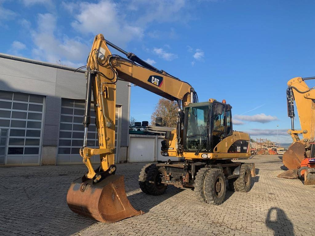 CAT M 316 D - Excavator pe roţi: Foto 1 CAT M 316 D - Excavator pe roţi: Foto 1