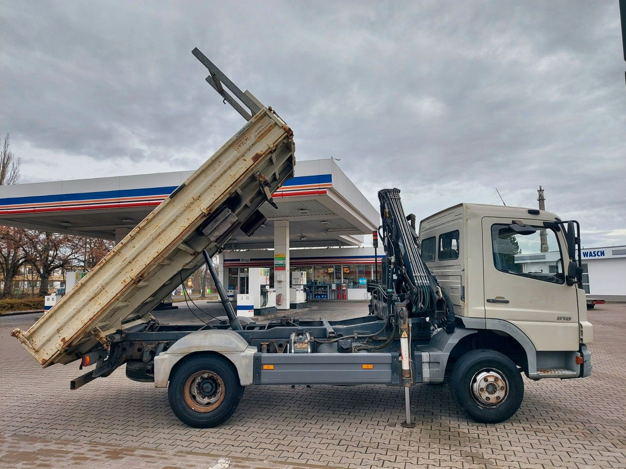 Mercedes-Benz Atego 2 4-Zyl. 4x2 918 4x2 MEILLER HIAB066 Kran - Camion basculantă, Camion cu macara: Foto 1 Mercedes-Benz Atego 2 4-Zyl. 4x2 918 4x2 MEILLER HIAB066 Kran - Camion basculantă, Camion cu macara: Foto 1