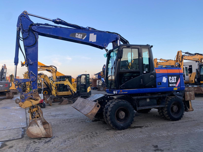 Caterpillar M313D NVT - Excavator pe roţi: Foto 2 Caterpillar M313D NVT - Excavator pe roţi: Foto 2