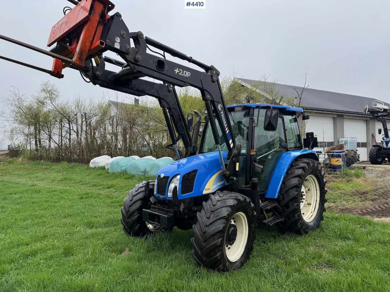 2006 New Holland TL100 A w/Front Loader. - Tractor agricol: Foto 1 2006 New Holland TL100 A w/Front Loader. - Tractor agricol: Foto 1