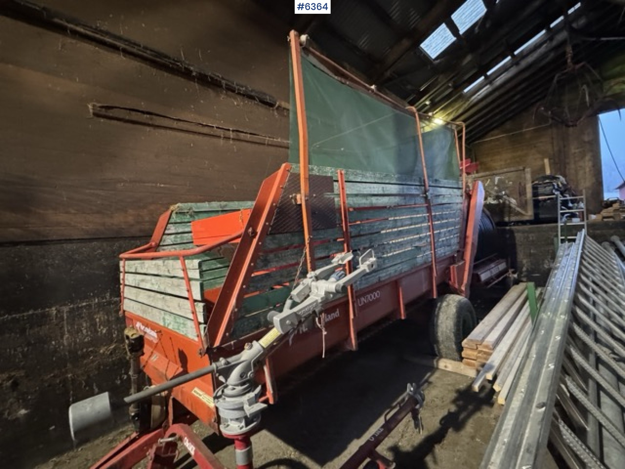 Approx. 1990 Kverneland UN7000 unloading wagon - Utilaje pentru fân: Foto 1 Approx. 1990 Kverneland UN7000 unloading wagon - Utilaje pentru fân: Foto 1