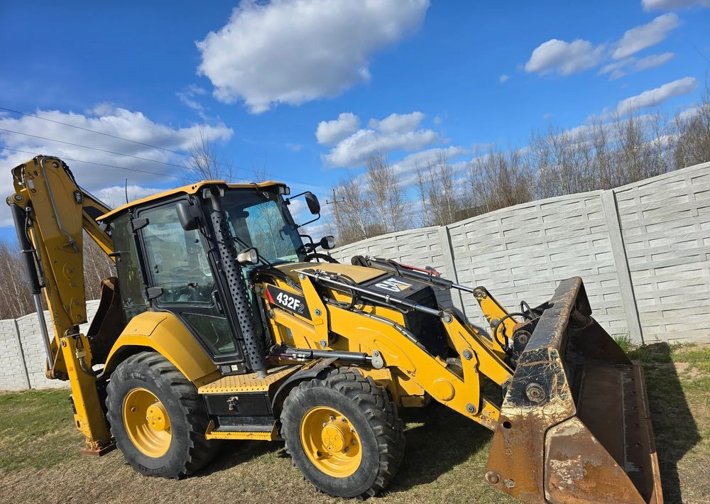 Caterpillar - Buldoexcavator: Foto 2 Caterpillar - Buldoexcavator: Foto 2