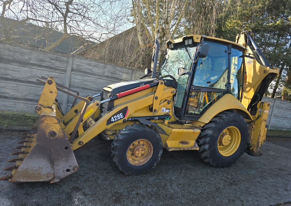 Caterpillar - Buldoexcavator: Foto 5 Caterpillar - Buldoexcavator: Foto 5