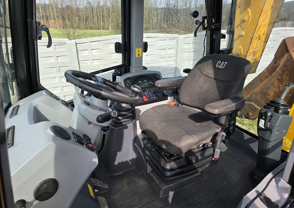 Caterpillar - Buldoexcavator: Foto 3 Caterpillar - Buldoexcavator: Foto 3