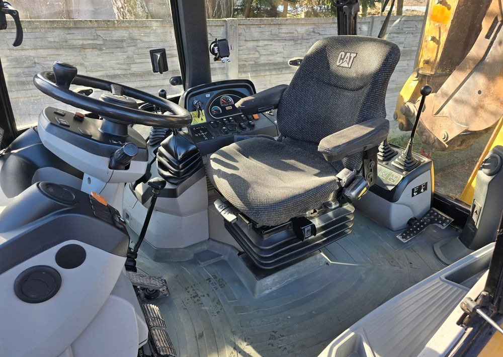 Caterpillar - Buldoexcavator: Foto 3 Caterpillar - Buldoexcavator: Foto 3