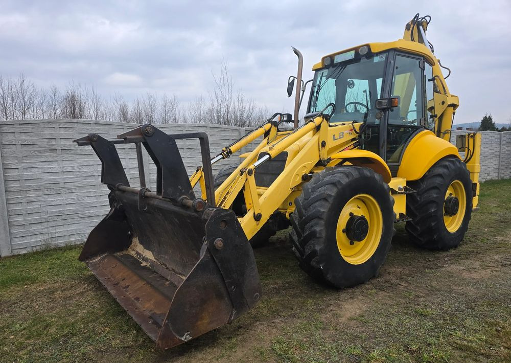 New Holland - Buldoexcavator: Foto 1 New Holland - Buldoexcavator: Foto 1