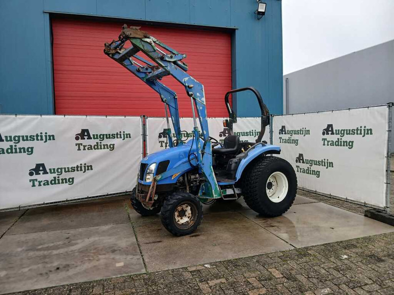 New Holland TC 40 - Tractor agricol: Foto 1 New Holland TC 40 - Tractor agricol: Foto 1