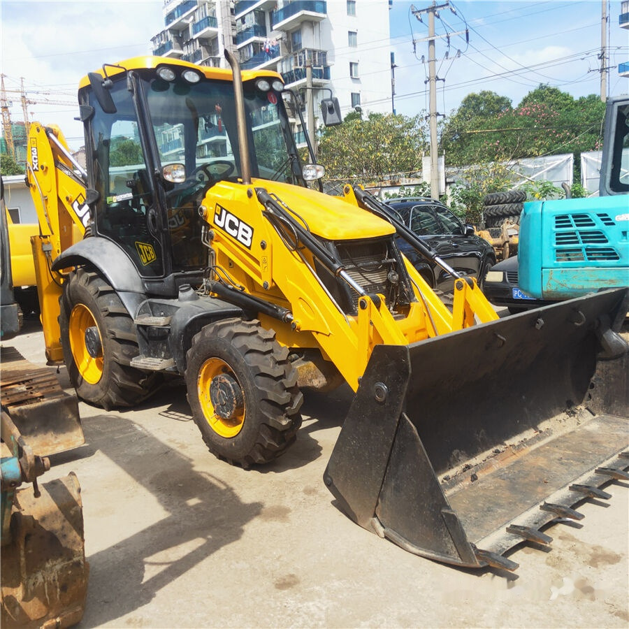 JCB 3CX - Buldoexcavator: Foto 1 JCB 3CX - Buldoexcavator: Foto 1