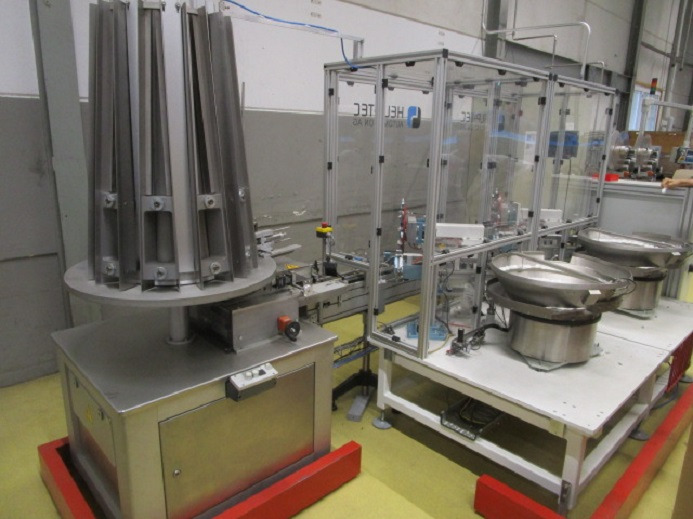 DECKEL ETIKETTIER ANLAGE SCHLEUTER GU 2 DO MIT 2xLÖFFELEINLEGESTATIONEN - Maşina de ambalat: Foto 1 DECKEL ETIKETTIER ANLAGE SCHLEUTER GU 2 DO MIT 2xLÖFFELEINLEGESTATIONEN - Maşina de ambalat: Foto 1