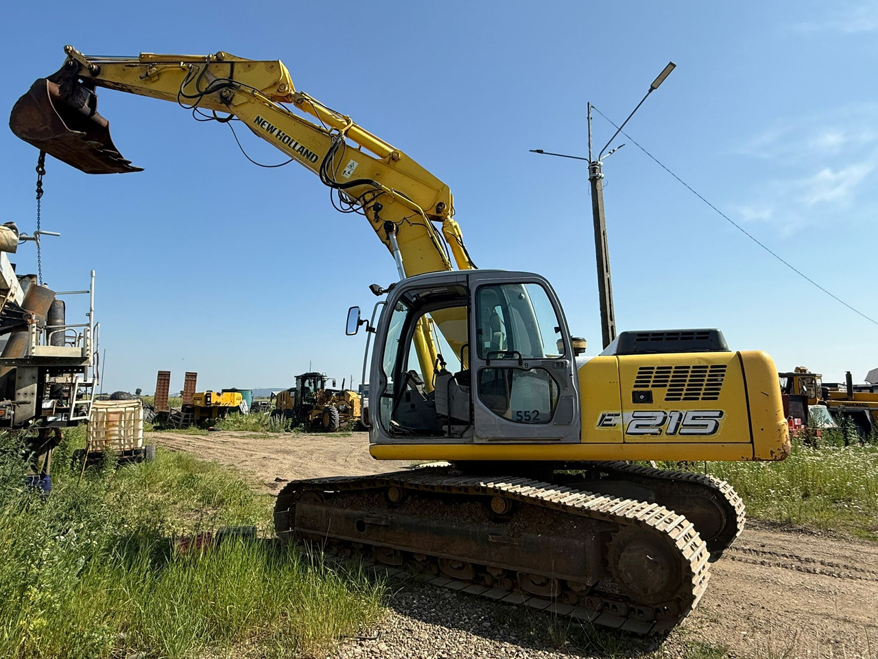 NEW HOLLAND E 215 EXCAVATOR - Excavator pe şenile: Foto 2 NEW HOLLAND E 215 EXCAVATOR - Excavator pe şenile: Foto 2