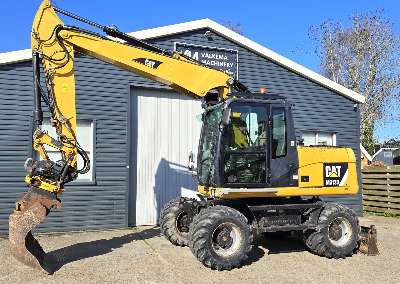 CATERPILLAR M313D - Excavator pe roţi: Foto 1 CATERPILLAR M313D - Excavator pe roţi: Foto 1