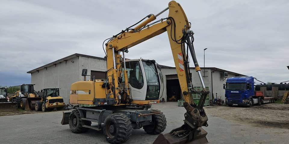 Koparka kołowa Liebherr A314 Litronic 9350 h+ 5 łyżek kołówka - Excavator pe roţi: Foto 4 Koparka kołowa Liebherr A314 Litronic 9350 h+ 5 łyżek kołówka - Excavator pe roţi: Foto 4