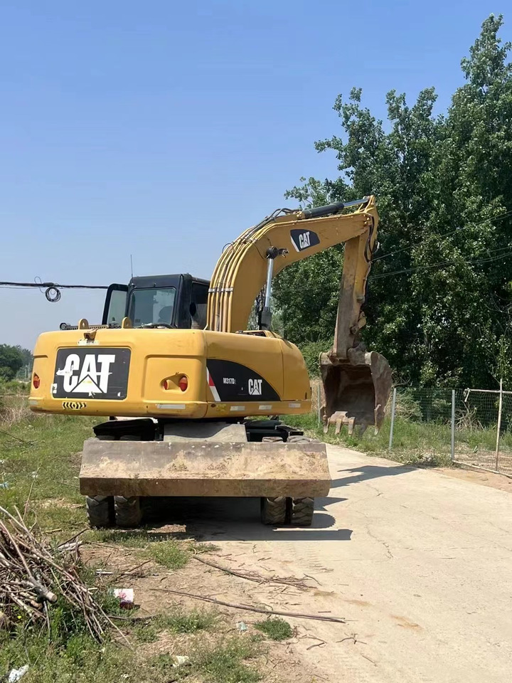 CATERPILLAR M317 - Excavator pe roţi: Foto 2 CATERPILLAR M317 - Excavator pe roţi: Foto 2