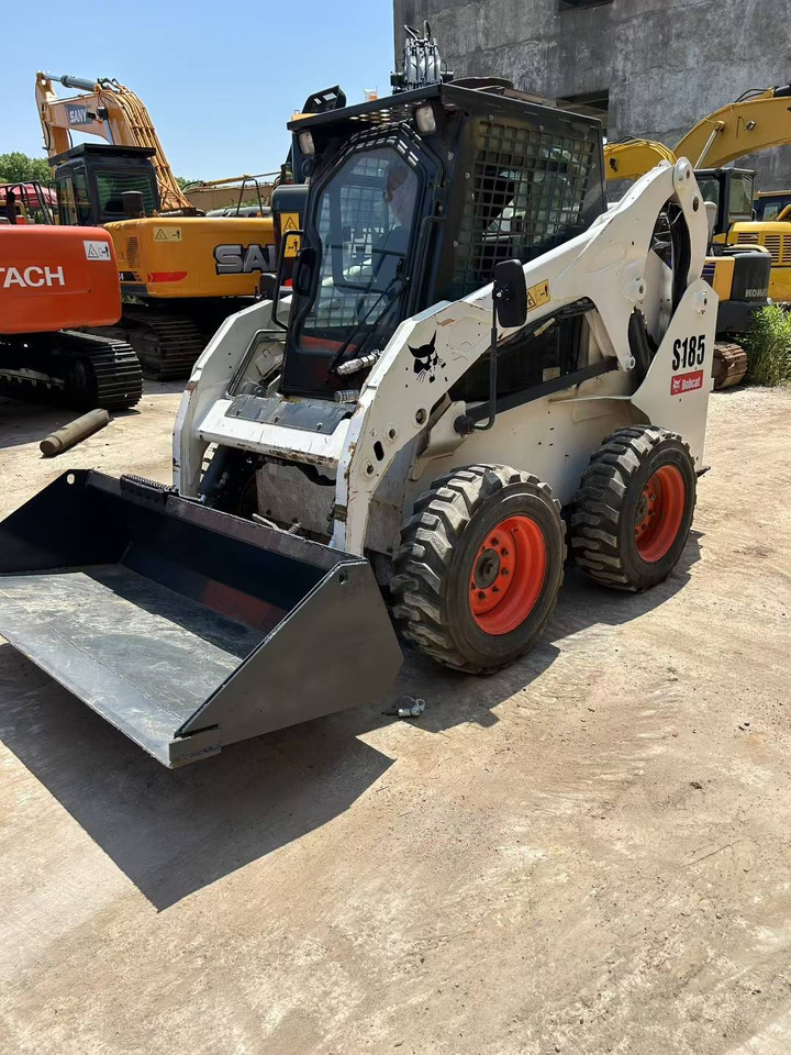 BOBCAT Skid Steer Loader S185 - Mini încărcător: Foto 1 BOBCAT Skid Steer Loader S185 - Mini încărcător: Foto 1
