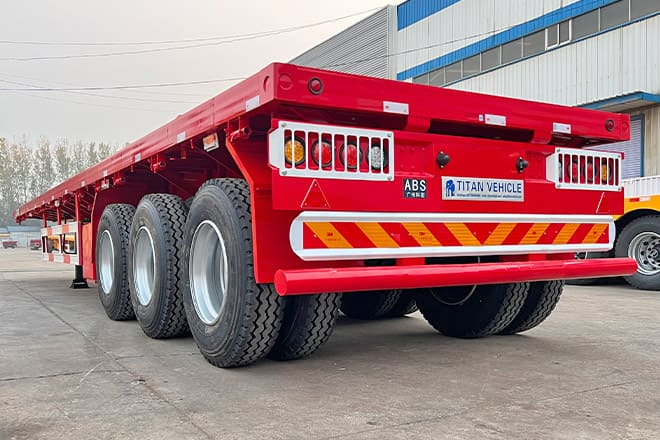 TITAN 3 Axle Flatbed Trailer for Sale in Senegal - Semiremorcă platformă: Foto 1 TITAN 3 Axle Flatbed Trailer for Sale in Senegal - Semiremorcă platformă: Foto 1