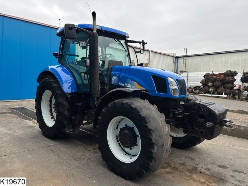 New Holland T6080 - Tractor agricol: Foto 4 New Holland T6080 - Tractor agricol: Foto 4