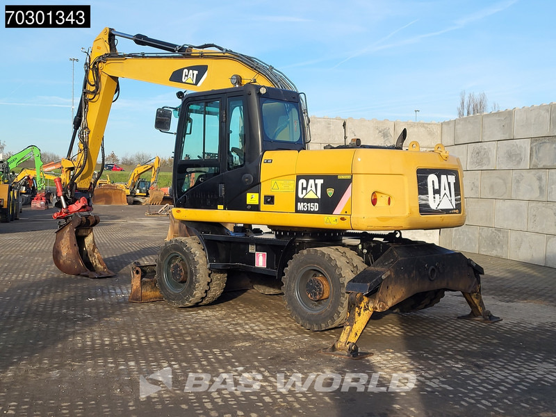 Caterpillar M315 D OUTRIGGERS + BLADE - Excavator pe roţi: Foto 3 Caterpillar M315 D OUTRIGGERS + BLADE - Excavator pe roţi: Foto 3