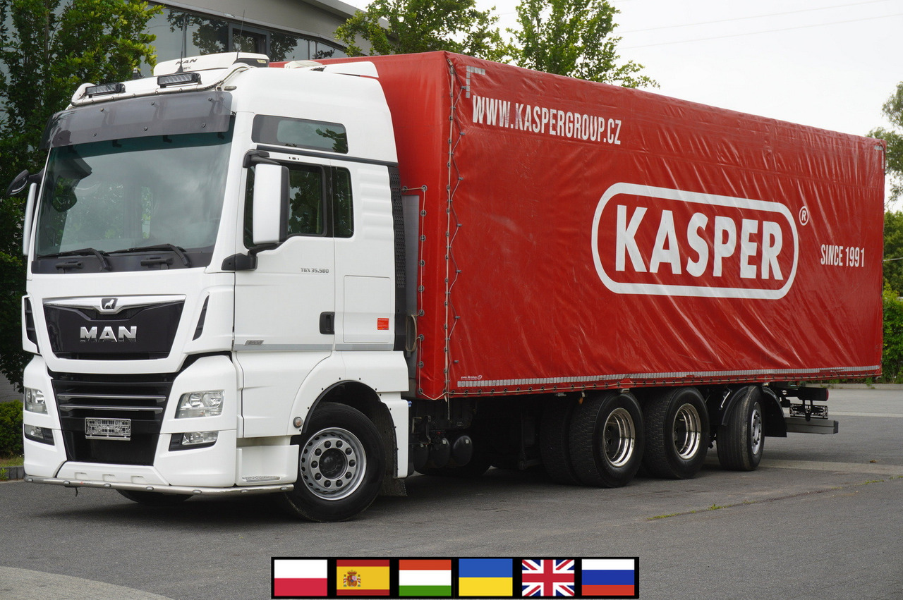 MAN TGX 35.580 E6 8x4 /4 / 23 EPAL tarp superstructure / 4th axle steered - Camion cu prelată: Foto 1 MAN TGX 35.580 E6 8x4 /4 / 23 EPAL tarp superstructure / 4th axle steered - Camion cu prelată: Foto 1