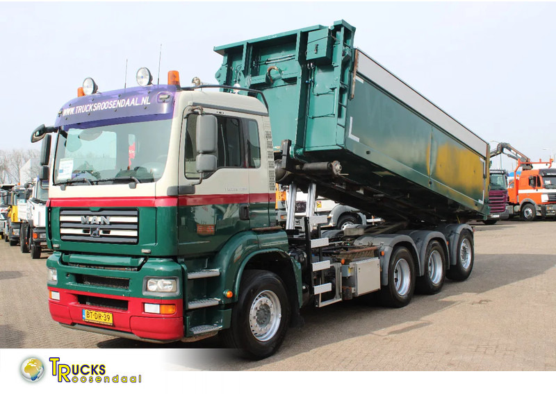 MAN TGA 35.400 8X4 + MANUAL! + NCH kipper/ bitum sprayer - Camion cu sistem de cablu: Foto 1 MAN TGA 35.400 8X4 + MANUAL! + NCH kipper/ bitum sprayer - Camion cu sistem de cablu: Foto 1