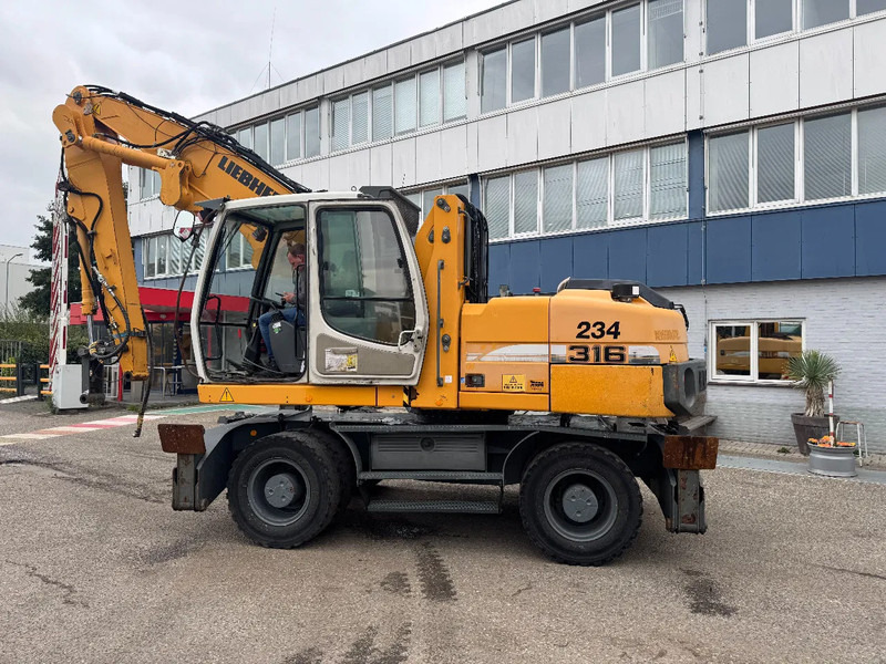 Liebherr A 316 LITRONIC CABIN HIGH CE - Excavator pentru manipulare de materiale: Foto 3 Liebherr A 316 LITRONIC CABIN HIGH CE - Excavator pentru manipulare de materiale: Foto 3