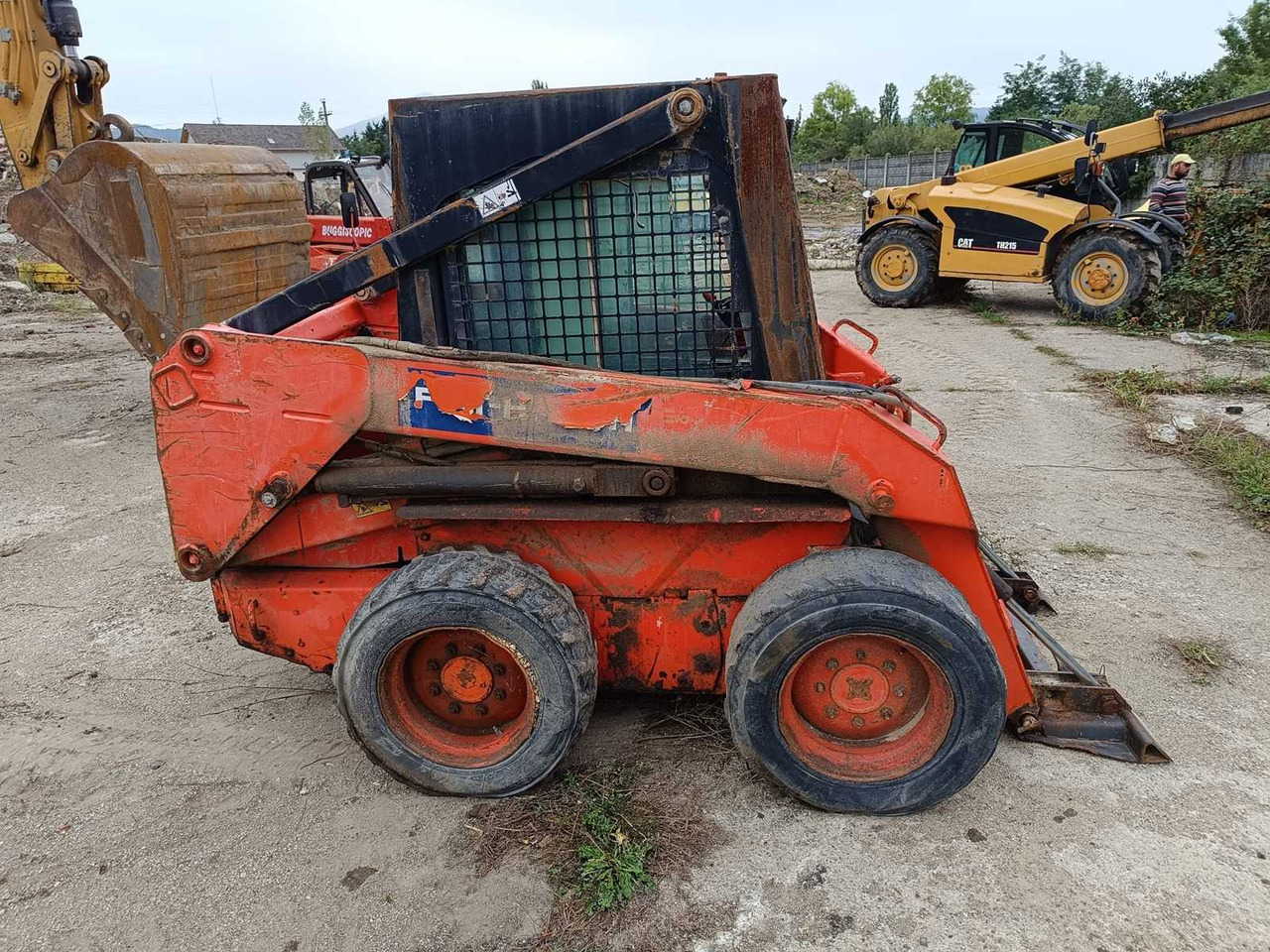 FIAT-HITACHI - SL45B - SKID STEER LOADER - 1998 - Mini încărcător pe şenile: Foto 5 FIAT-HITACHI - SL45B - SKID STEER LOADER - 1998 - Mini încărcător pe şenile: Foto 5