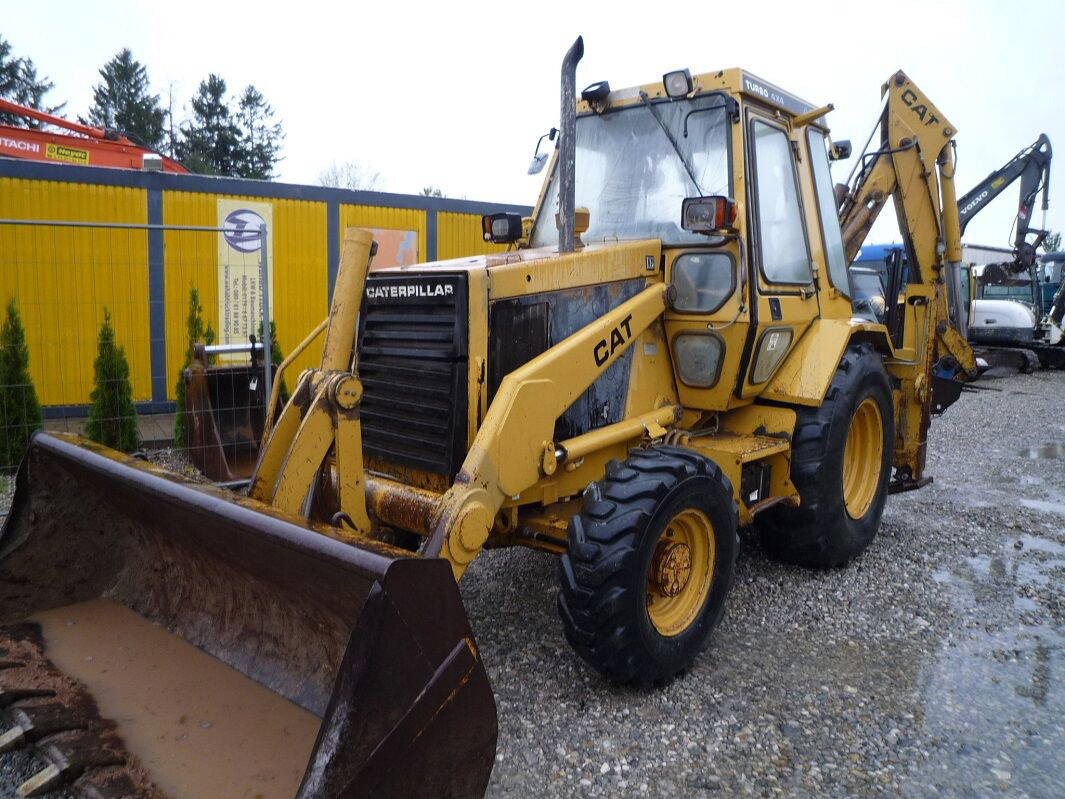 Caterpillar 438 438 - Buldoexcavator: Foto 1 Caterpillar 438 438 - Buldoexcavator: Foto 1
