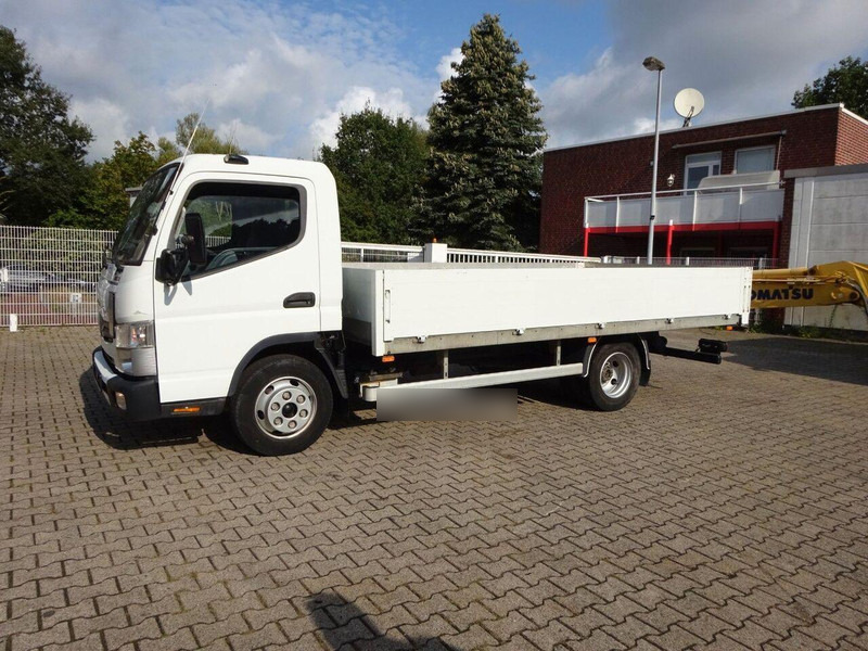 Mitsubishi Fuso Canter 7C15 - Flatbed - Camion platformă: Foto 1 Mitsubishi Fuso Canter 7C15 - Flatbed - Camion platformă: Foto 1