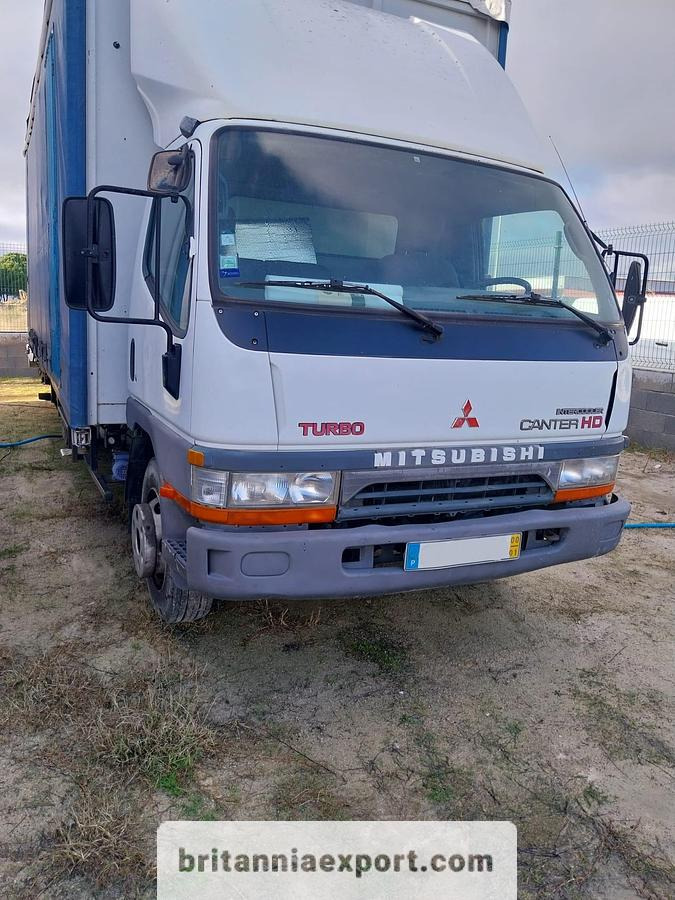 MITSUBISHI Canter FE659 HD 3.9 TD | Euro 2 | 7.5 ton | Tail Lift - Camion cu prelată: Foto 2 MITSUBISHI Canter FE659 HD 3.9 TD | Euro 2 | 7.5 ton | Tail Lift - Camion cu prelată: Foto 2
