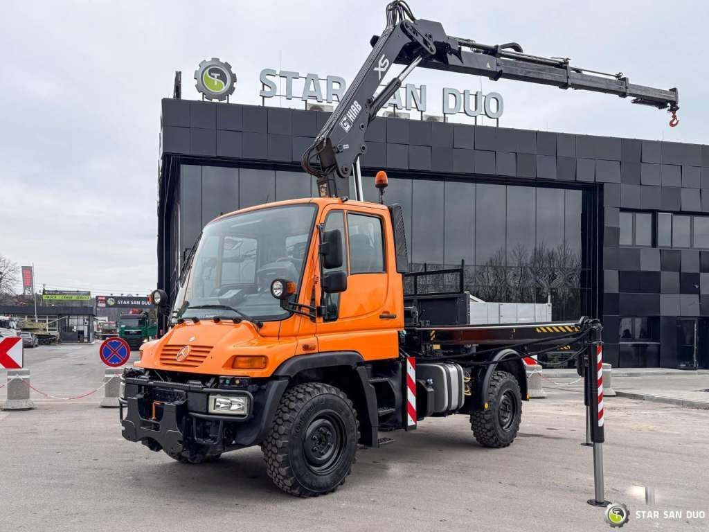 Unimog Mercedes-Benz UNIMOG U300 4x4 HIAB 122 D-3 CRANE Unimog Mercedes-Benz UNIMOG U300 4x4 HIAB 122 D-3 CRANE - Camion cu macara, Camion platformă: Foto 1 Unimog Mercedes-Benz UNIMOG U300 4x4 HIAB 122 D-3 CRANE Unimog Mercedes-Benz UNIMOG U300 4x4 HIAB 122 D-3 CRANE - Camion cu macara, Camion platformă: Foto 1