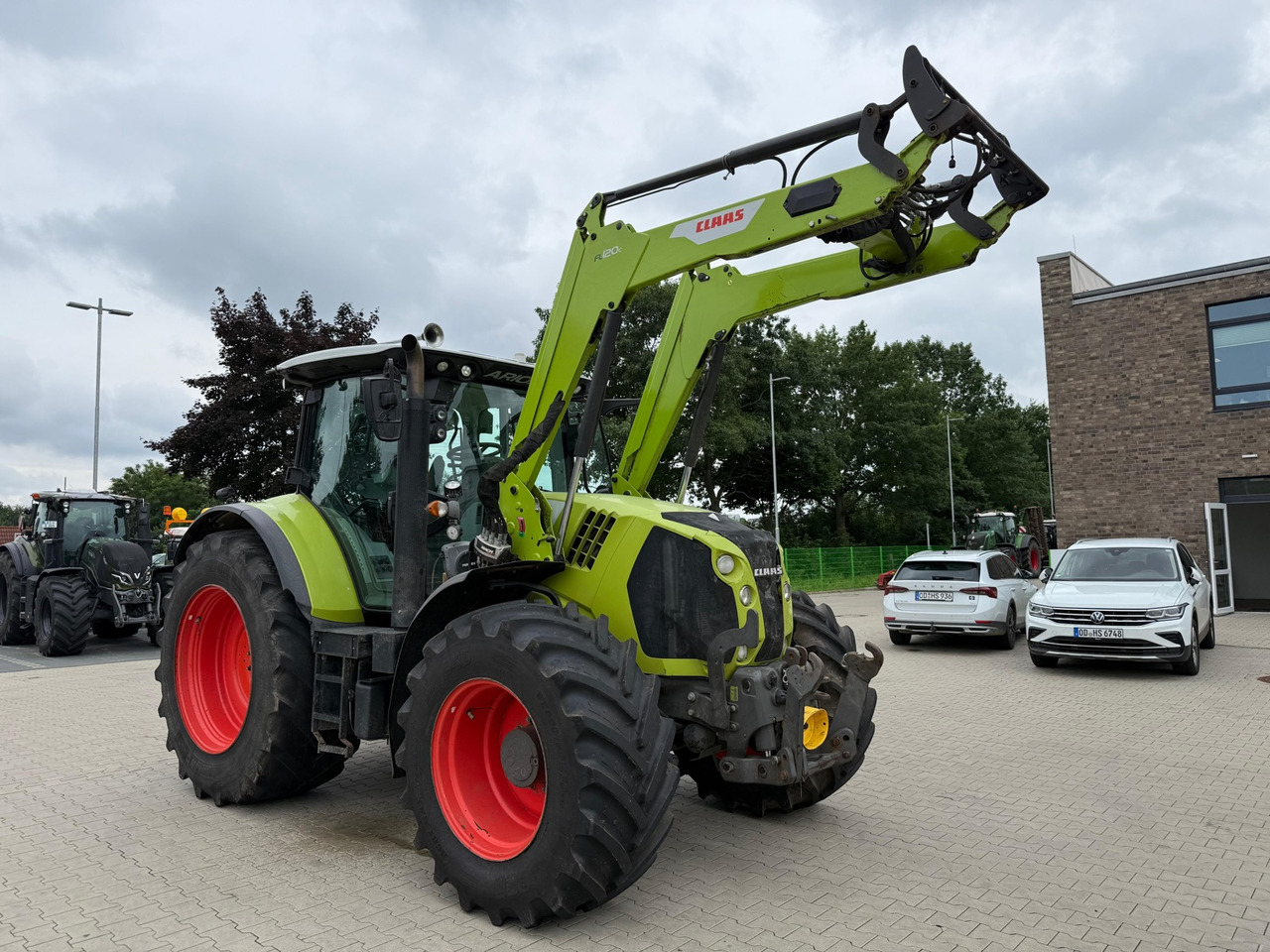 Claas Arion 650 C-Matic - Tractor agricol: Foto 1 Claas Arion 650 C-Matic - Tractor agricol: Foto 1