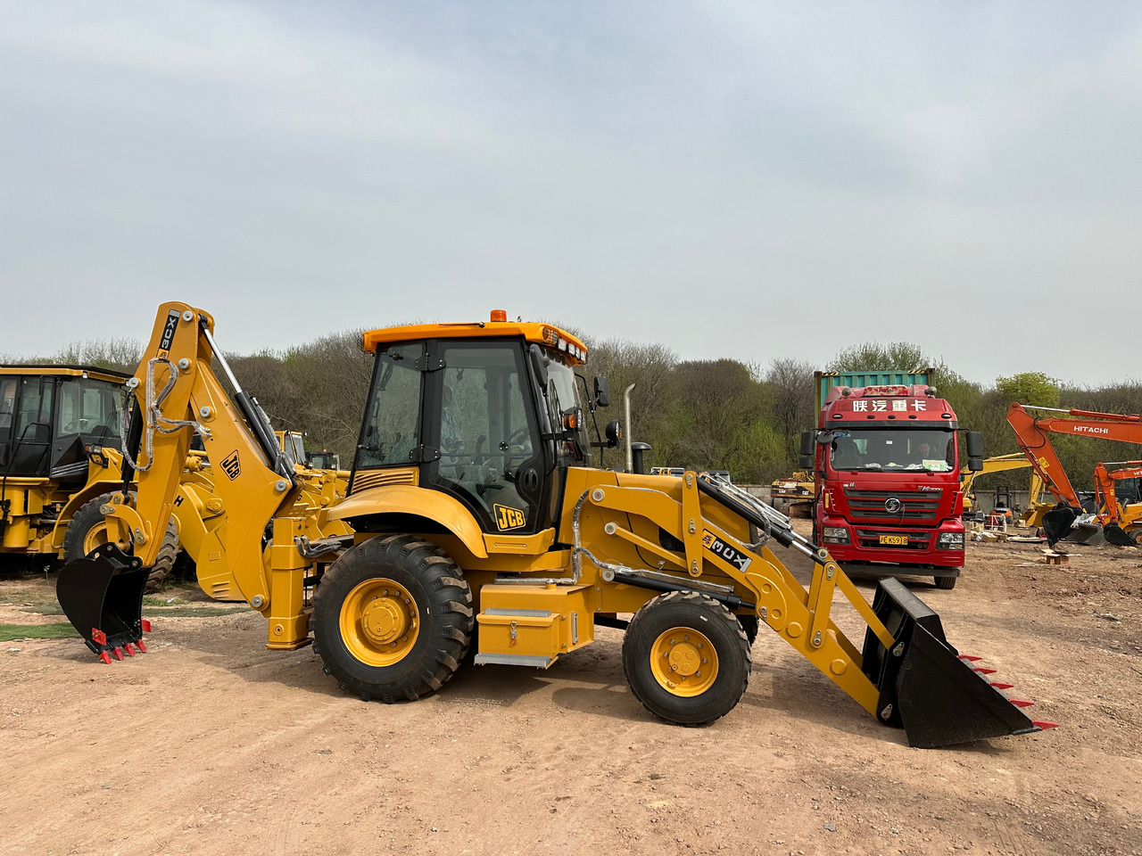 JCB 3CX - Buldoexcavator: Foto 1 JCB 3CX - Buldoexcavator: Foto 1