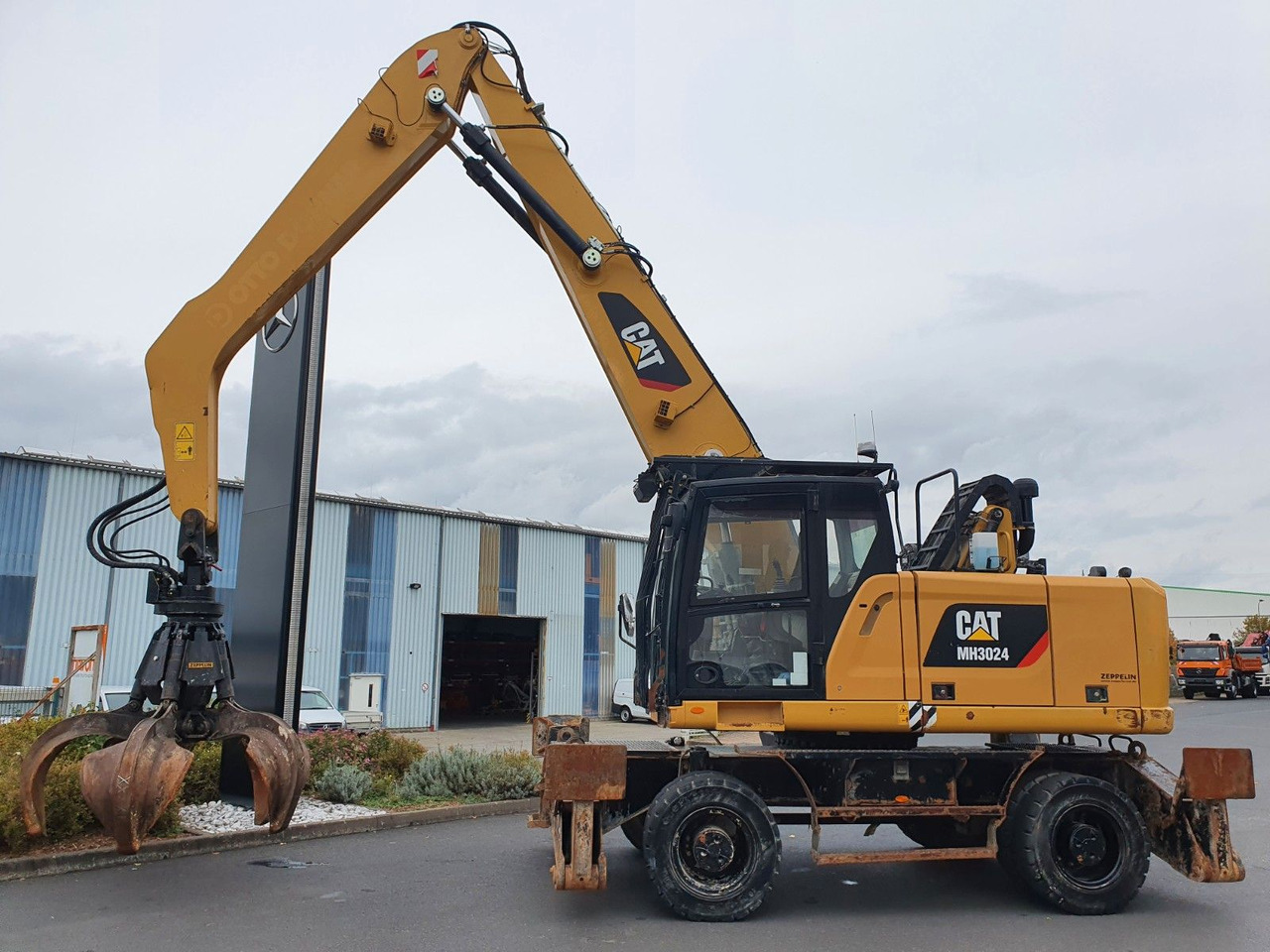 CAT MH3024 / MH 3024 / Greifer / 2018 / 9.424h - Excavator pe roţi: Foto 3 CAT MH3024 / MH 3024 / Greifer / 2018 / 9.424h - Excavator pe roţi: Foto 3