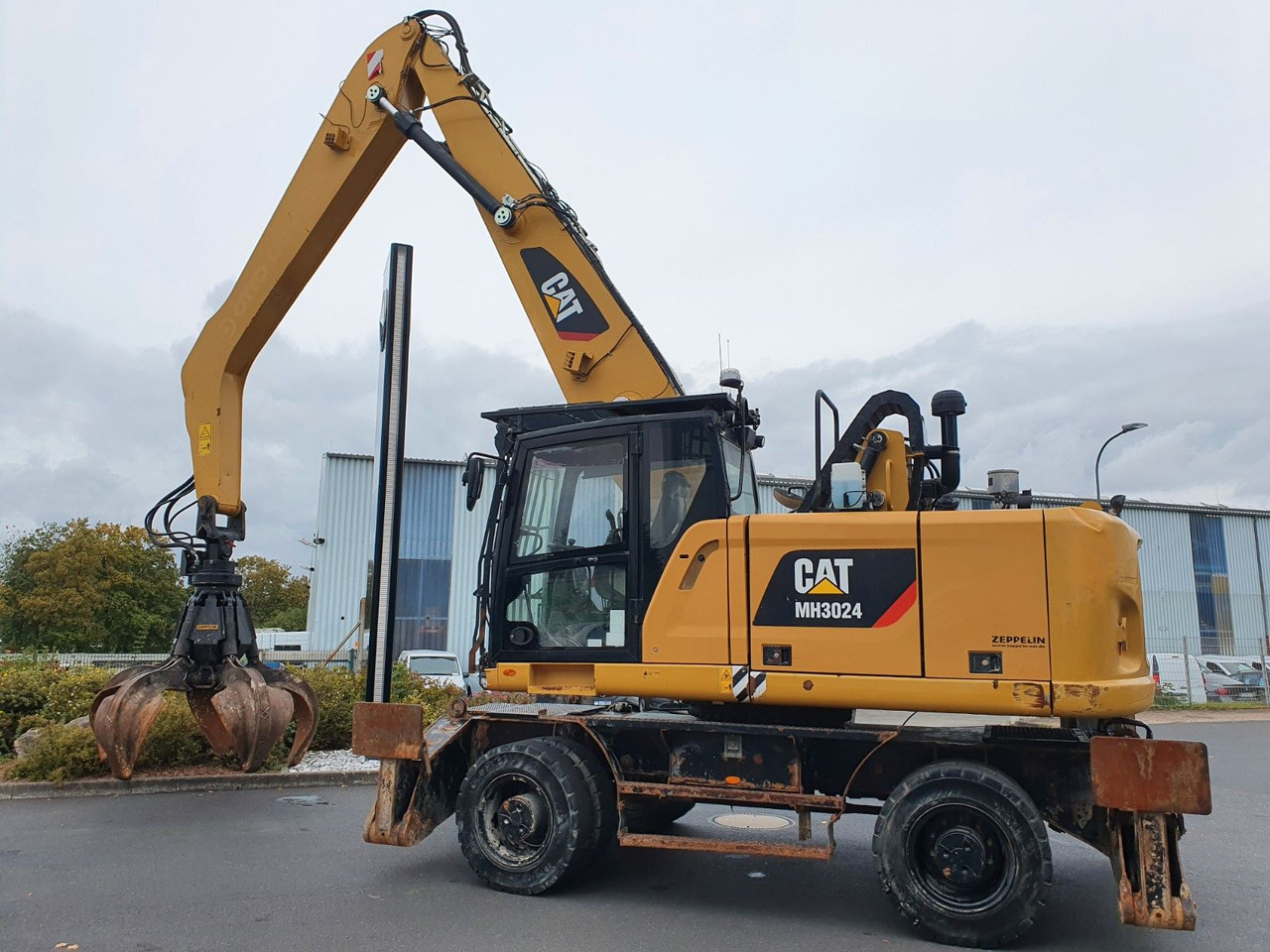 CAT MH3024 / MH 3024 / Greifer / 2018 / 9.424h - Excavator pe roţi: Foto 4 CAT MH3024 / MH 3024 / Greifer / 2018 / 9.424h - Excavator pe roţi: Foto 4