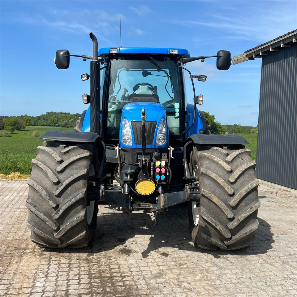 Tractor agricol New Holland T6050: Foto 14 Tractor agricol New Holland T6050: Foto 14