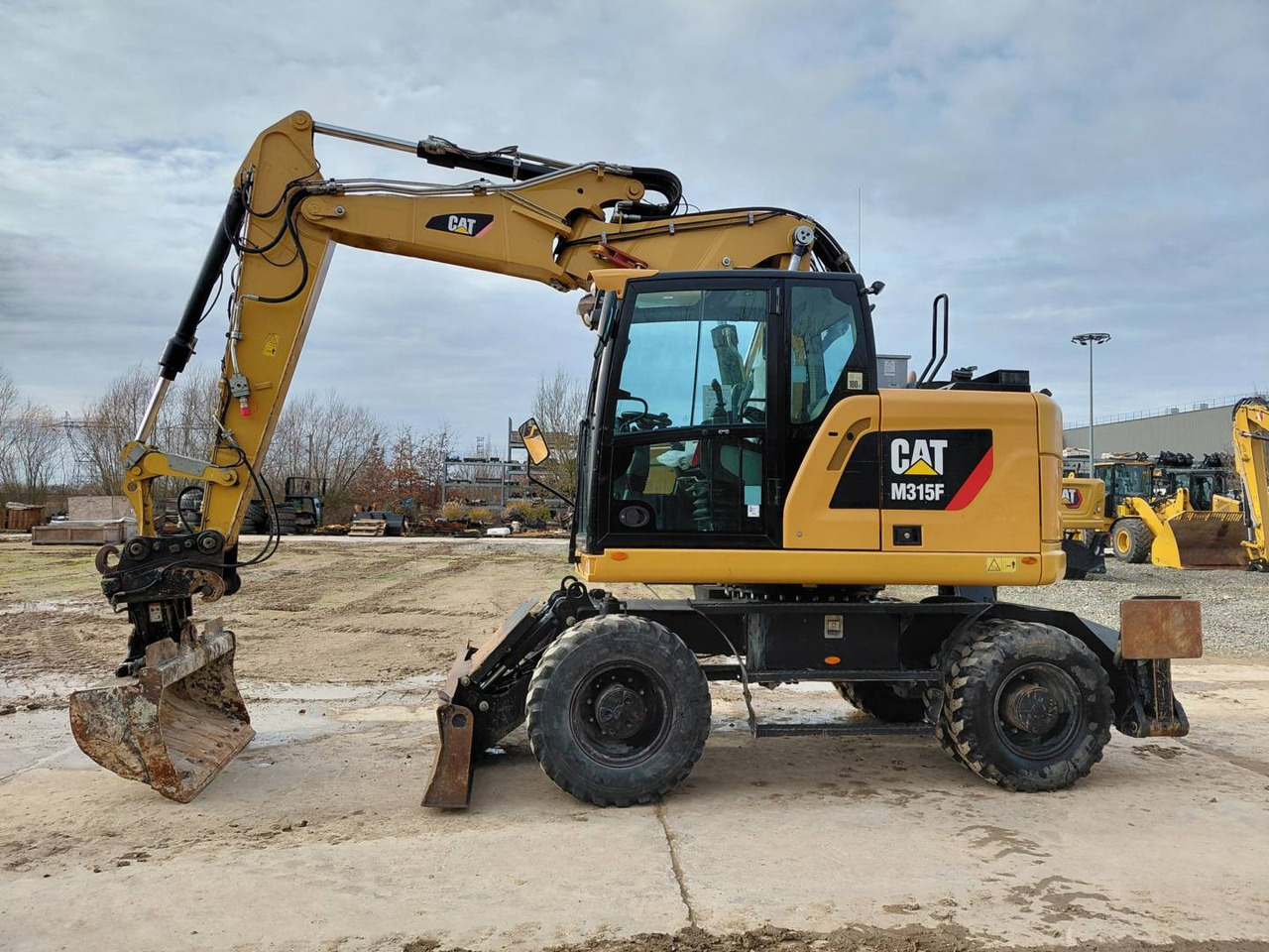 CAT M315F IVC - Excavator pe roţi: Foto 1 CAT M315F IVC - Excavator pe roţi: Foto 1