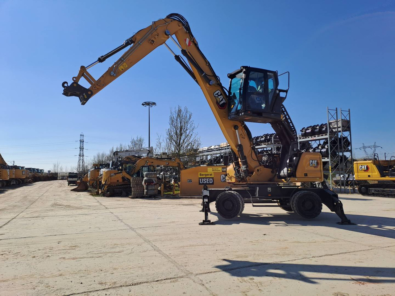 CAT MH3024 - Excavator pe roţi: Foto 1 CAT MH3024 - Excavator pe roţi: Foto 1