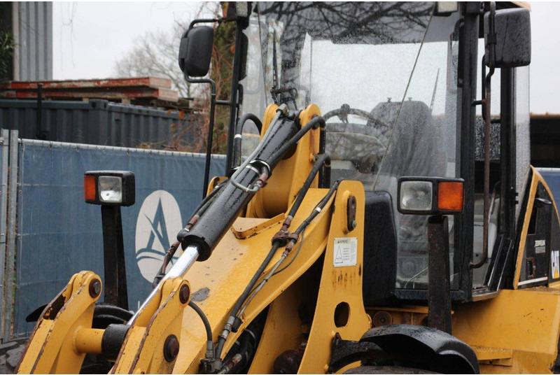 Încărcător frontal pe pneuri Caterpillar 908: Foto 10 Încărcător frontal pe pneuri Caterpillar 908: Foto 10